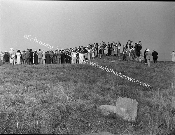 PILGRIMS LISTEN TO FR M D'ARCY S.J. PREACHING